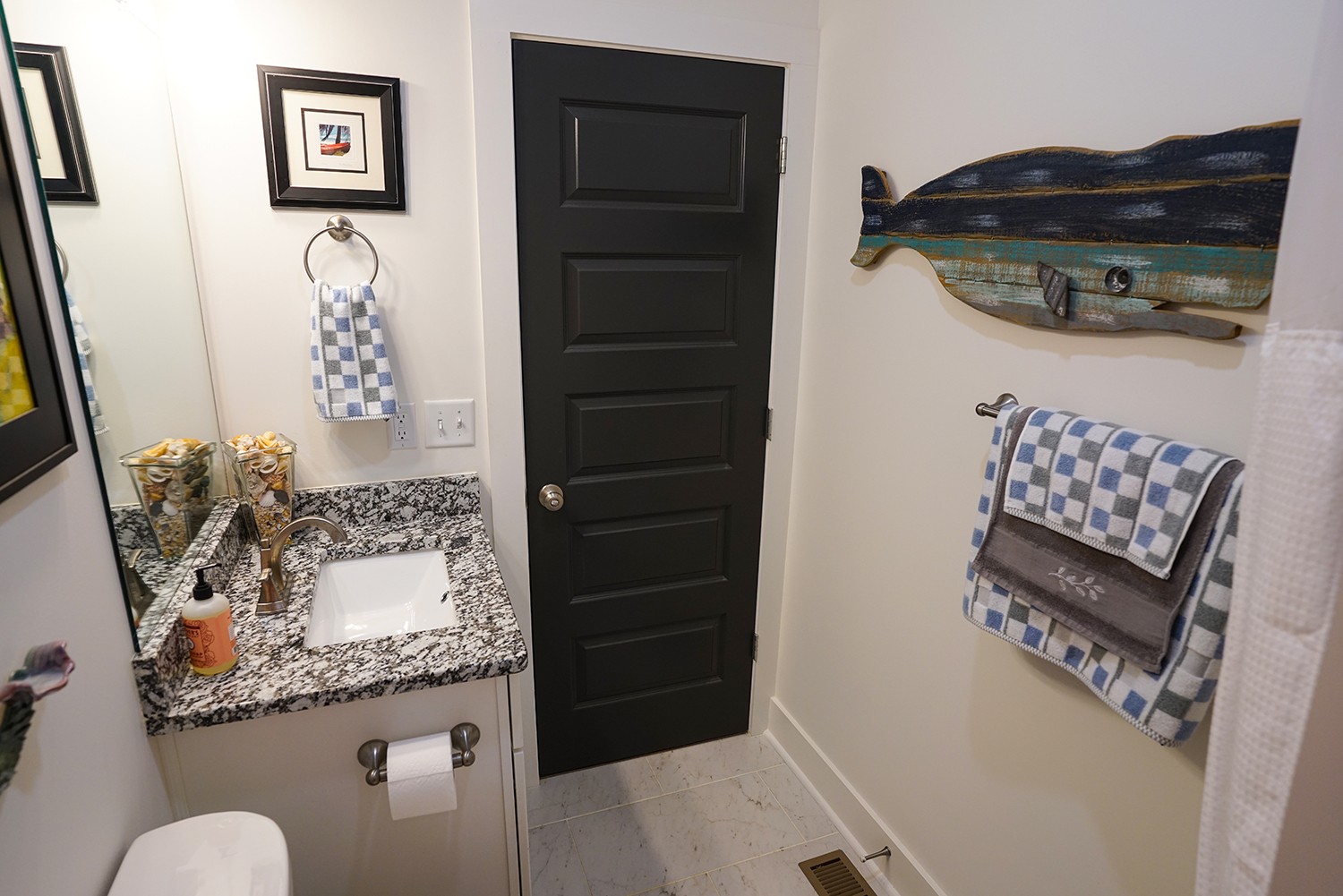 124 Piney Road Dickson, TN 37055 - Photo 37 of 39 a bathroom with a granite countertop sink a toilet and shower