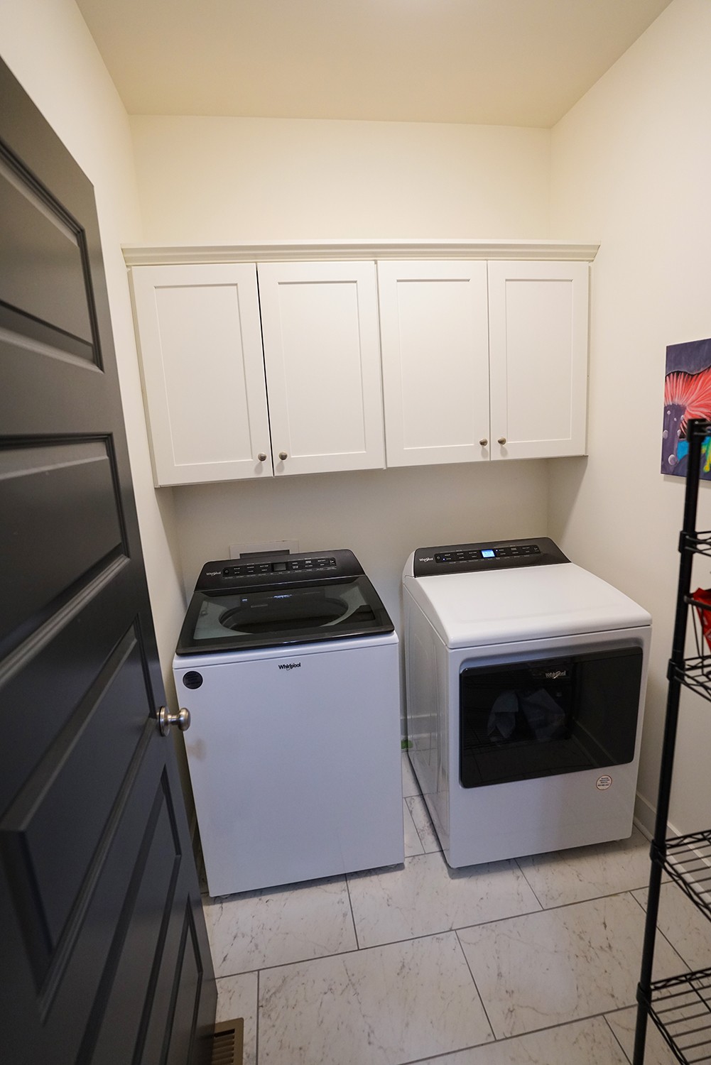 124 Piney Road Dickson, TN 37055 - Photo 39 of 39 a utility room with dryer and washer