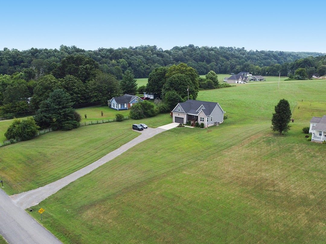 124 Piney Road Dickson, TN 37055 - Photo 4 of 39 a view of a lake with a park