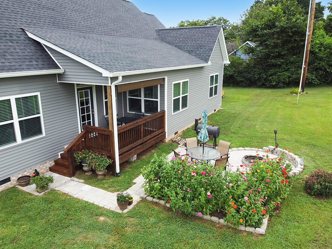 124 Piney Road Dickson, TN 37055 - Photo 9 of 39 a front view of a house with garden