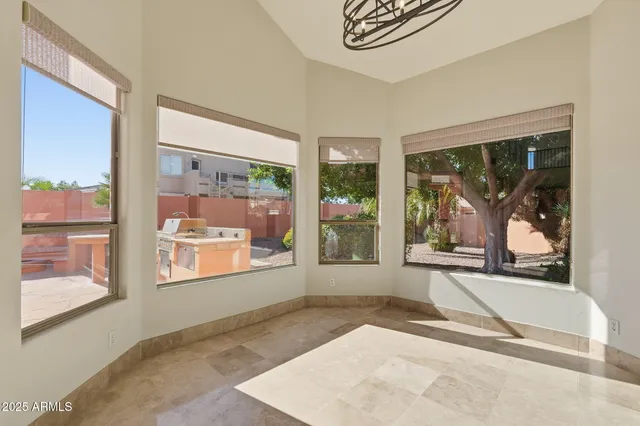 a view of a room with a large window