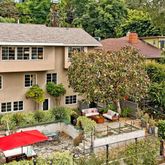 a front view of a house with yard