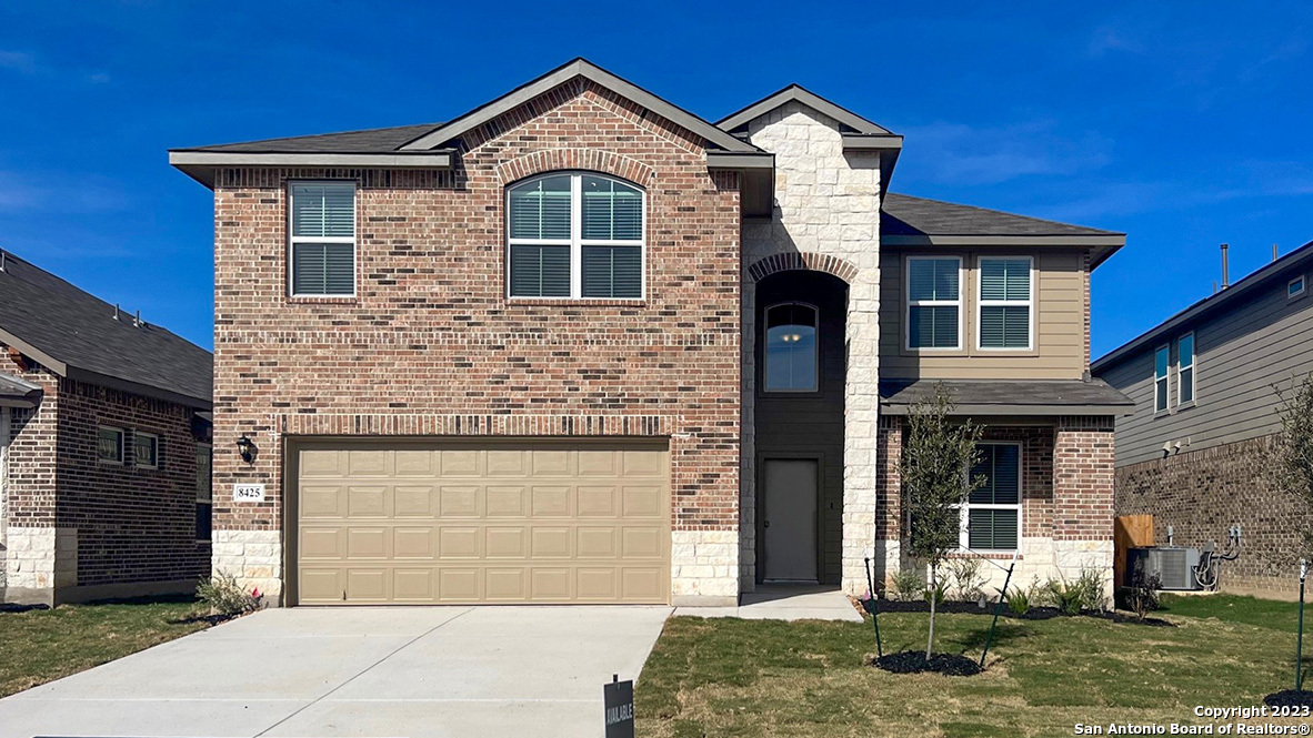 8425 Knapp Rise San Antonio, TX 78254 - Photo 1 of 1 a front view of a house with a yard