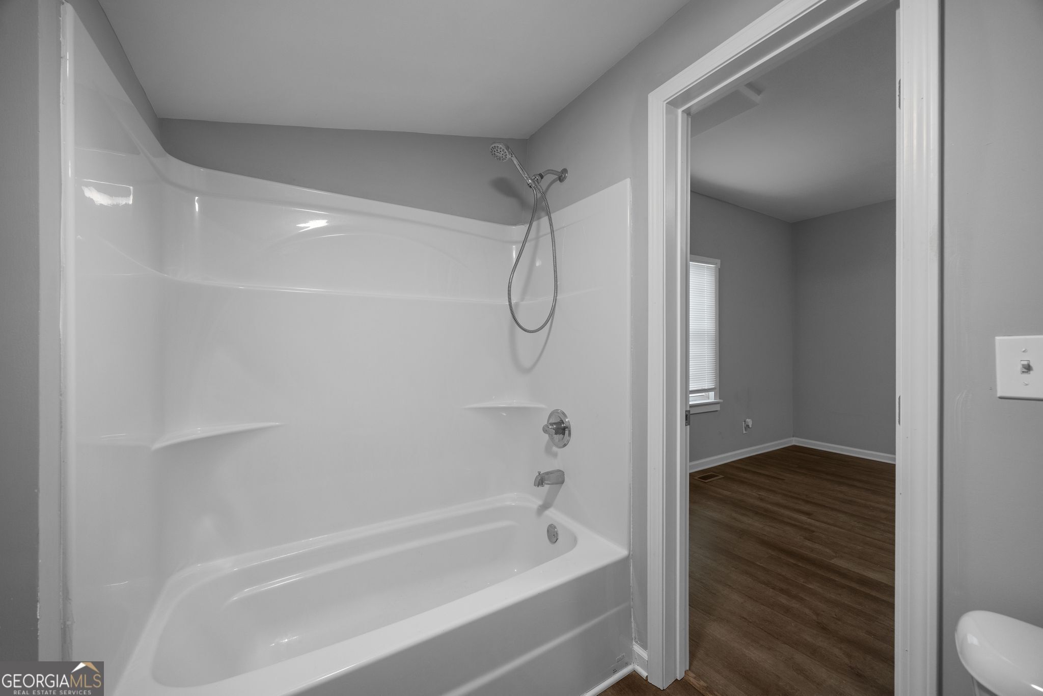 743 Pine Street Trion, GA 30753 - Photo 22 of 31 a bathroom with a bathtub and shower