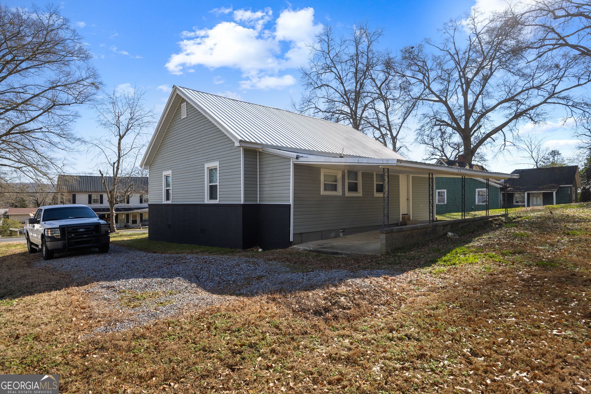 743 Pine Street Trion, GA 30753 - Photo 27 of 31 a view of a house with a yard