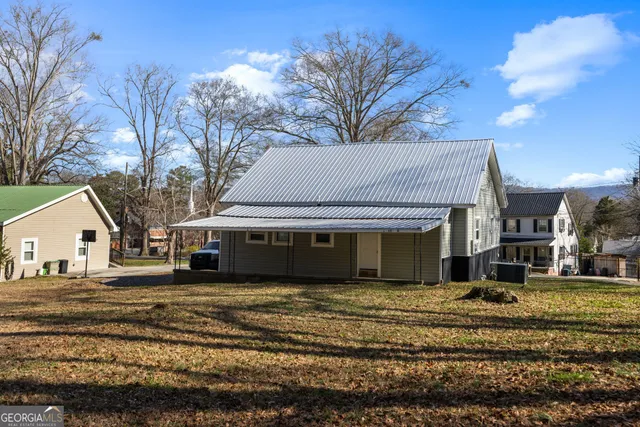 a view of a house with a big yard