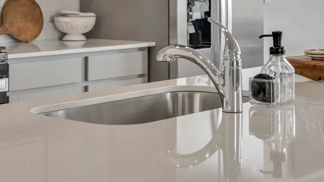 a view of a sink in a kitchen