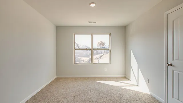 an empty room with a window