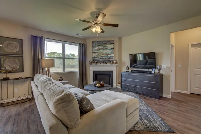 a bedroom with a bed and a fireplace