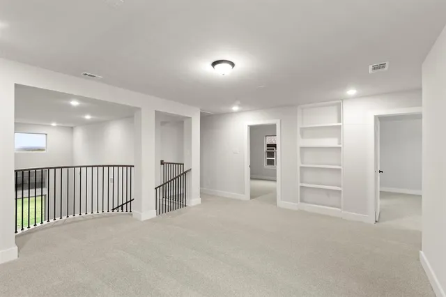 a view of a hallway with closet area