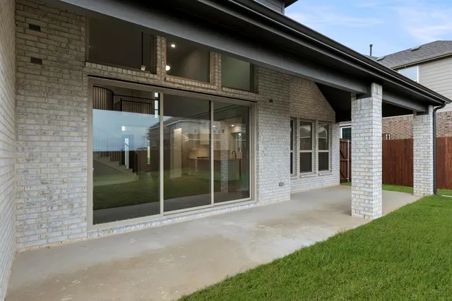 a view of a house with a garden