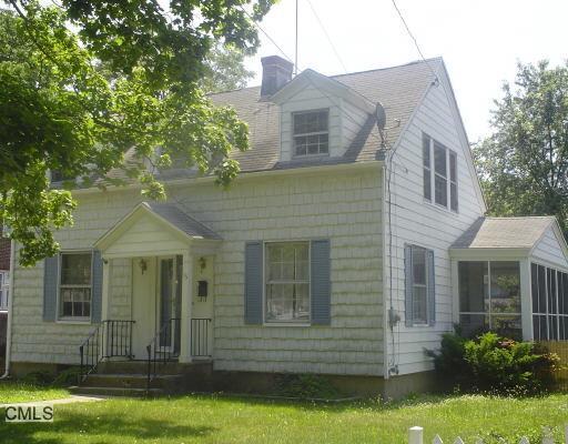 15 Ralph Street Stamford, CT 06902 - Photo 1 of 1 a front view of a house with a yard and garage
