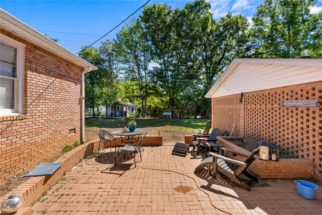 605 Sherry Drive Anderson, SC 29621 - Photo 30 of 36 Enjoy outdoor living on this charming patio, perfect for relaxation and entertaining.