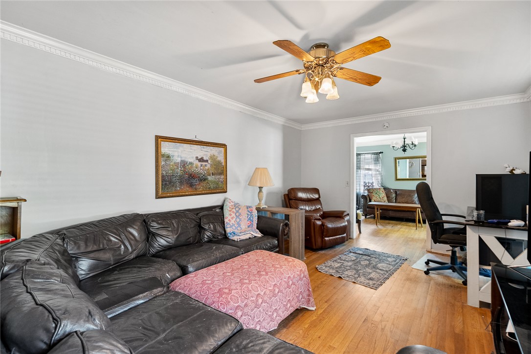 605 Sherry Drive Anderson, SC 29621 - Photo 5 of 36 This inviting living space features warm wood floors, elegant crown molding, and an open layout.