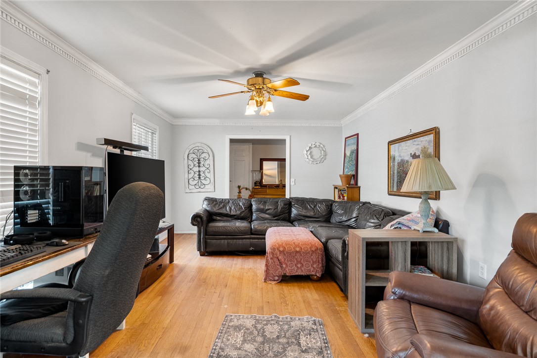 605 Sherry Drive Anderson, SC 29621 - Photo 6 of 36 Bright and airy living room with warm hardwood floors and elegant crown molding.