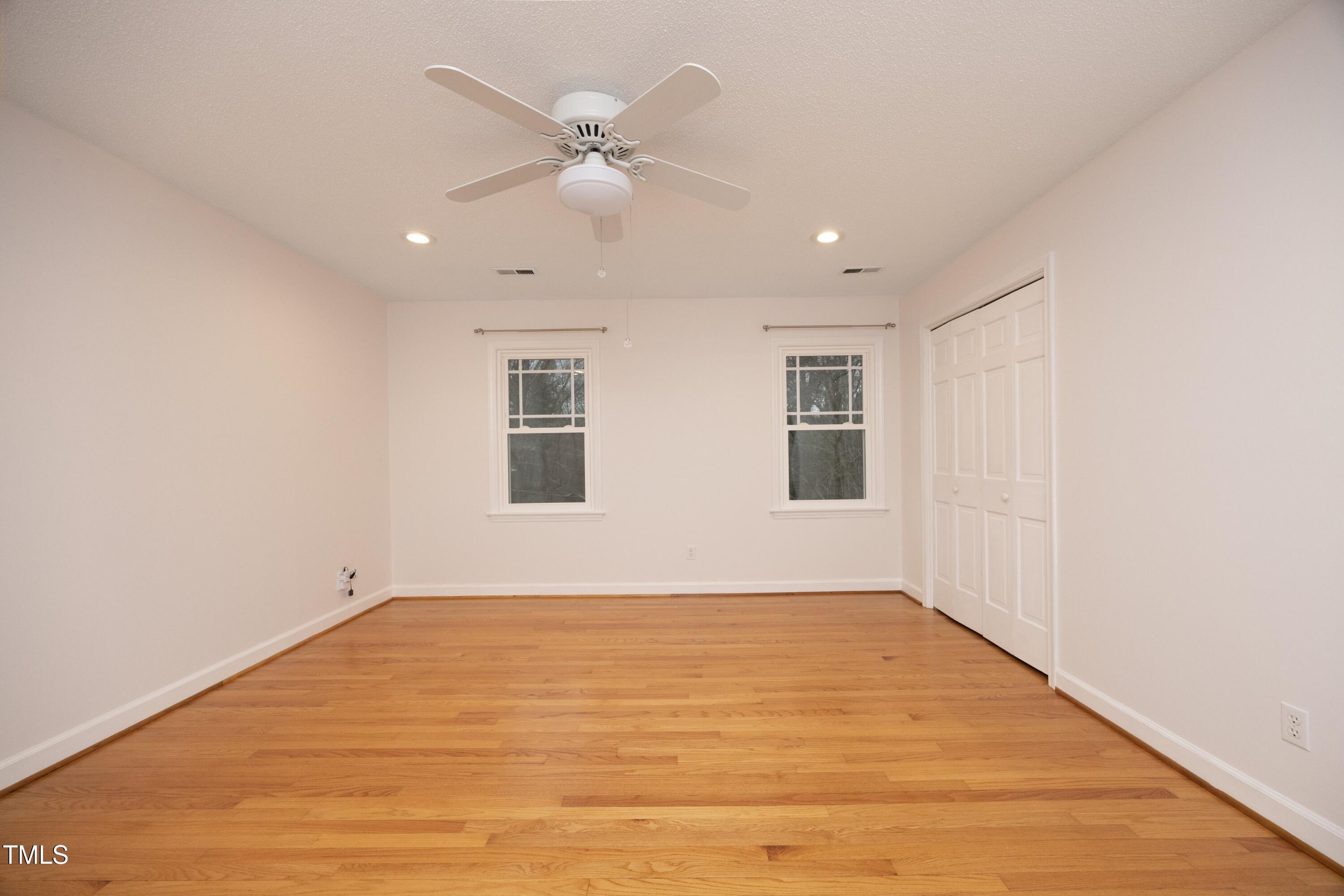 4616 Oak Park Road Raleigh, NC 27612 - Photo 32 of 63 3rd secondary bedroom with hardwoods & ceiling fan