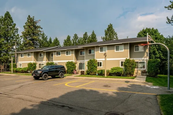a car parked in front of a house
