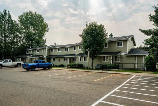 a cars parked in front of a building
