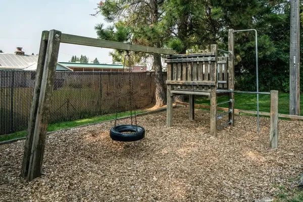 a view of a deck with a backyard