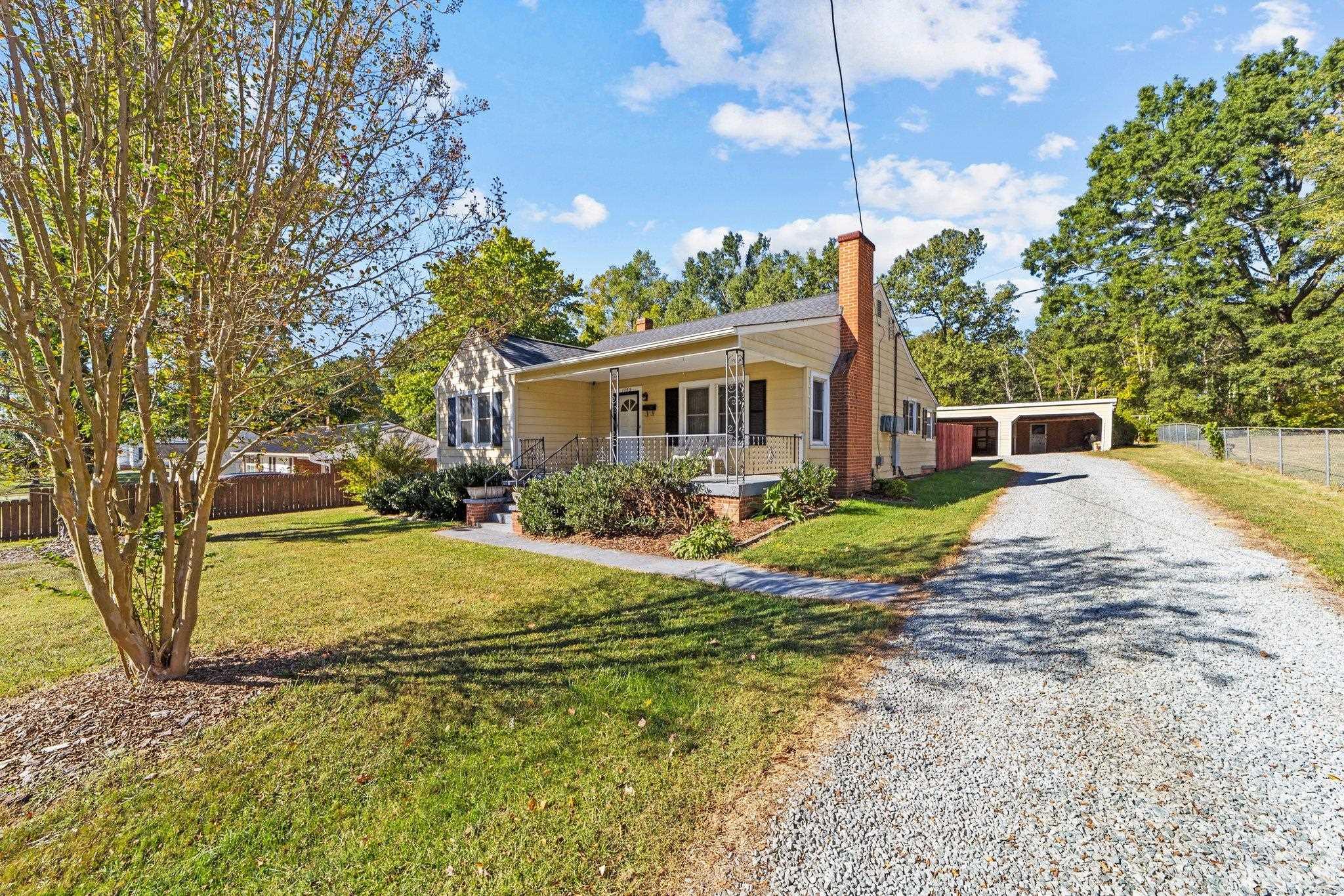 1253 Pointer Street Roxboro, NC 27573 - Photo 3 of 30 a view of a house with a yard