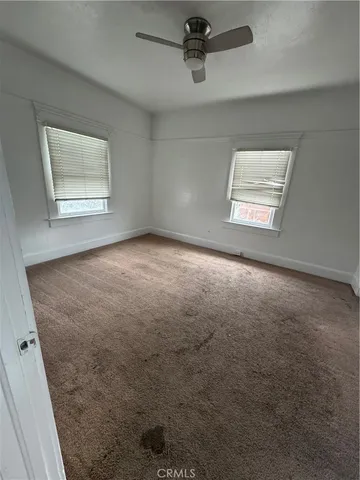 a bathroom with a tub a sink and a shower