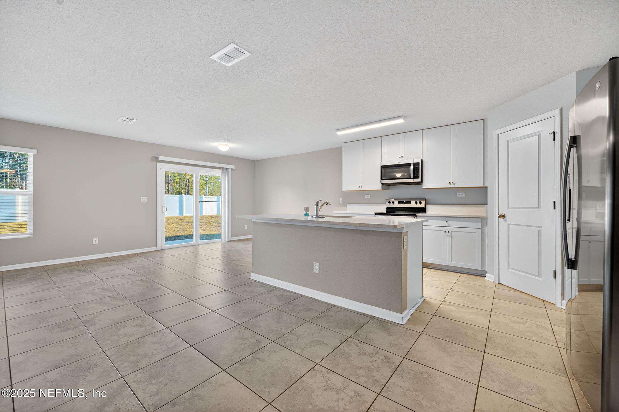 4920 Morning Rise Circle Jacksonville, FL 32218 - Photo 5 of 34 23_4920_Morning_Rise_Cir_Jacksonville_FL