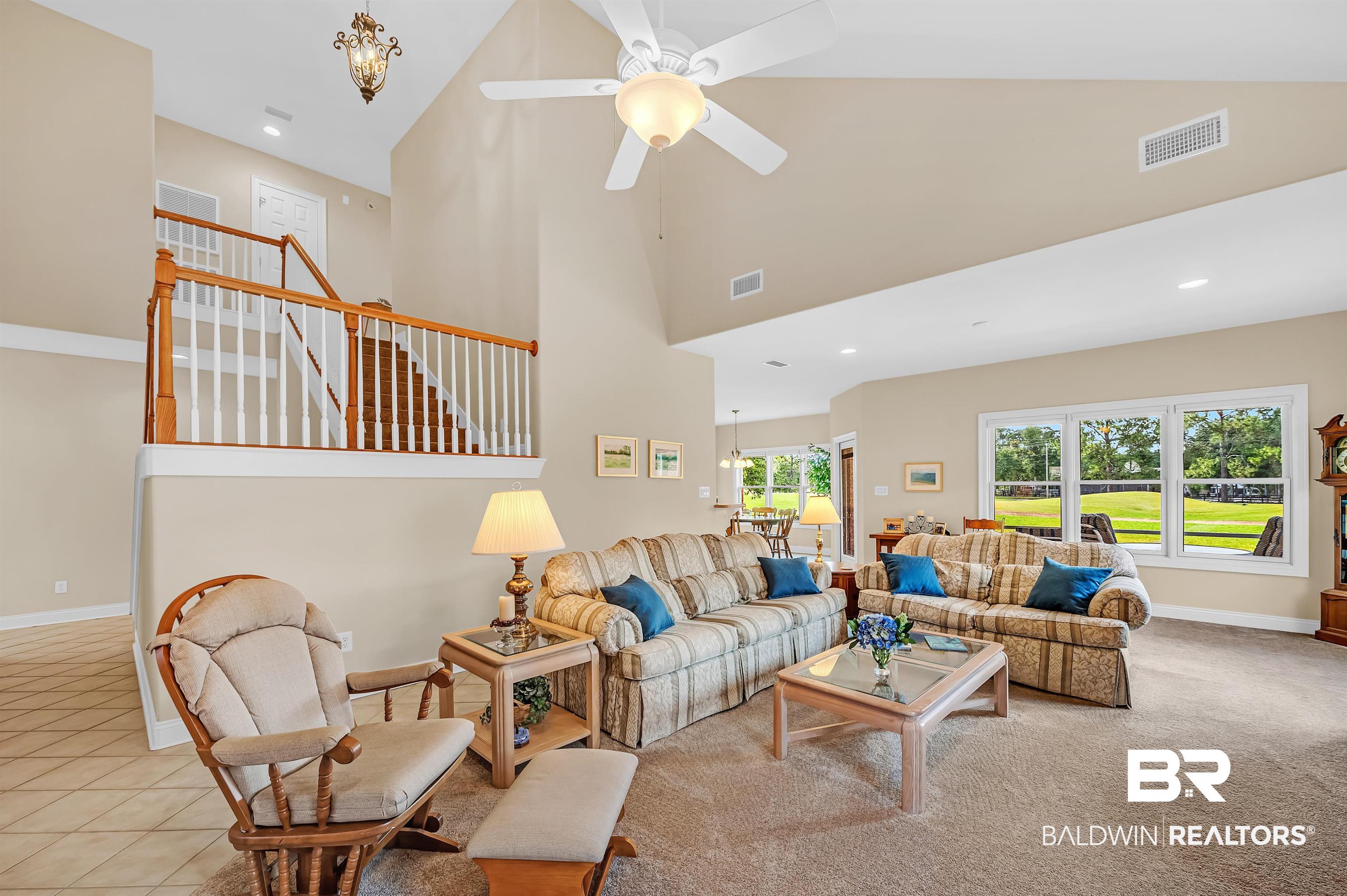 22739 Inverness Way Foley, AL 36535 - Photo 4 of 80 Living room featuring high vaulted ceiling, baseboards, ceiling fan, and recessed lighting
