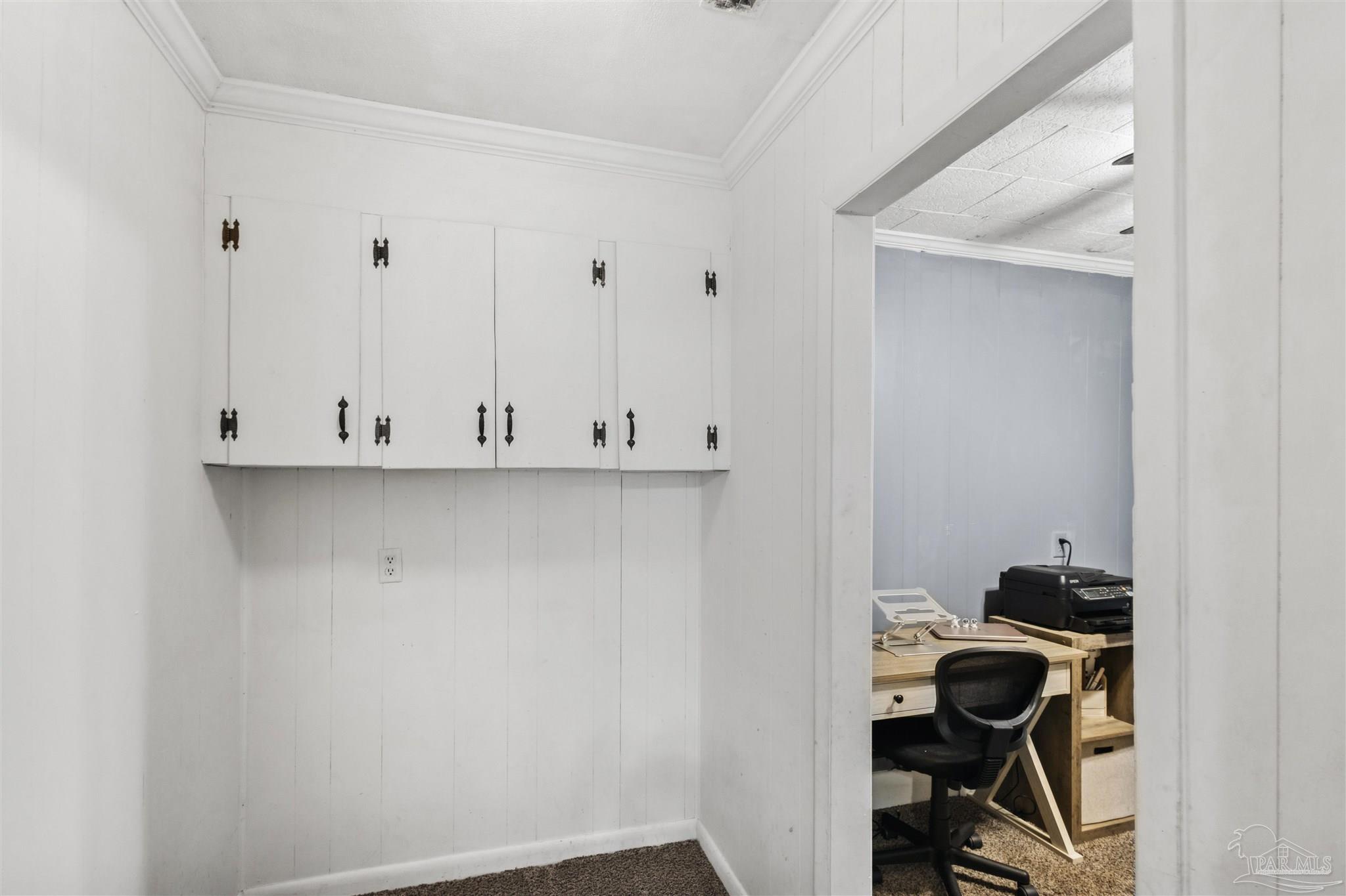 4176 Morristown Road Jay, FL 32565 - Photo 16 of 41 a view of workspace with wooden cabinet