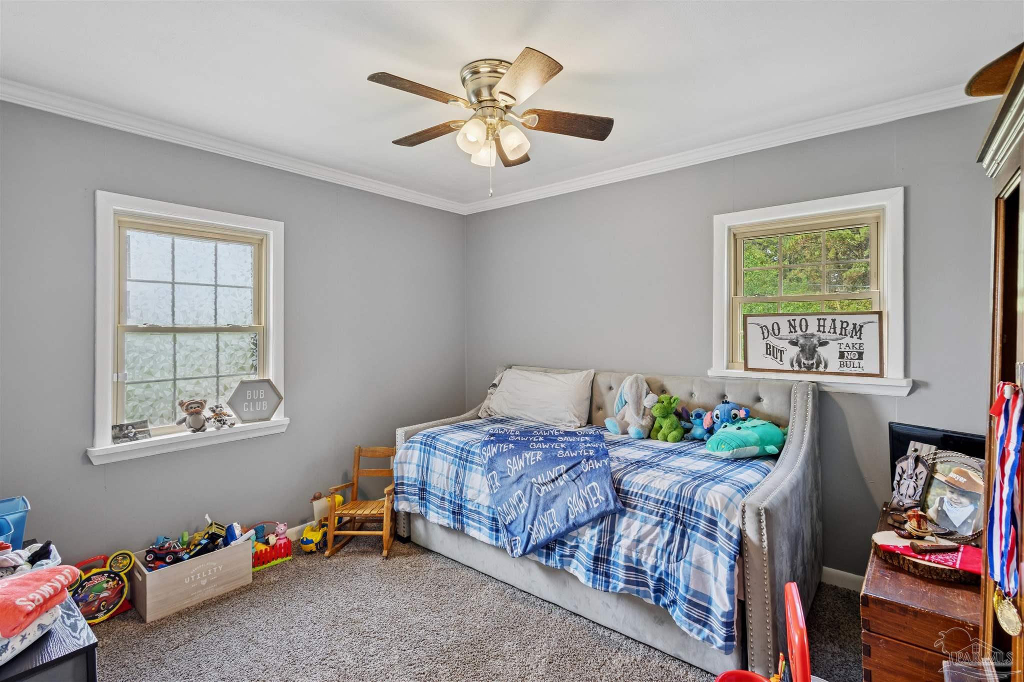 4176 Morristown Road Jay, FL 32565 - Photo 23 of 41 a bedroom that has a bed and a window