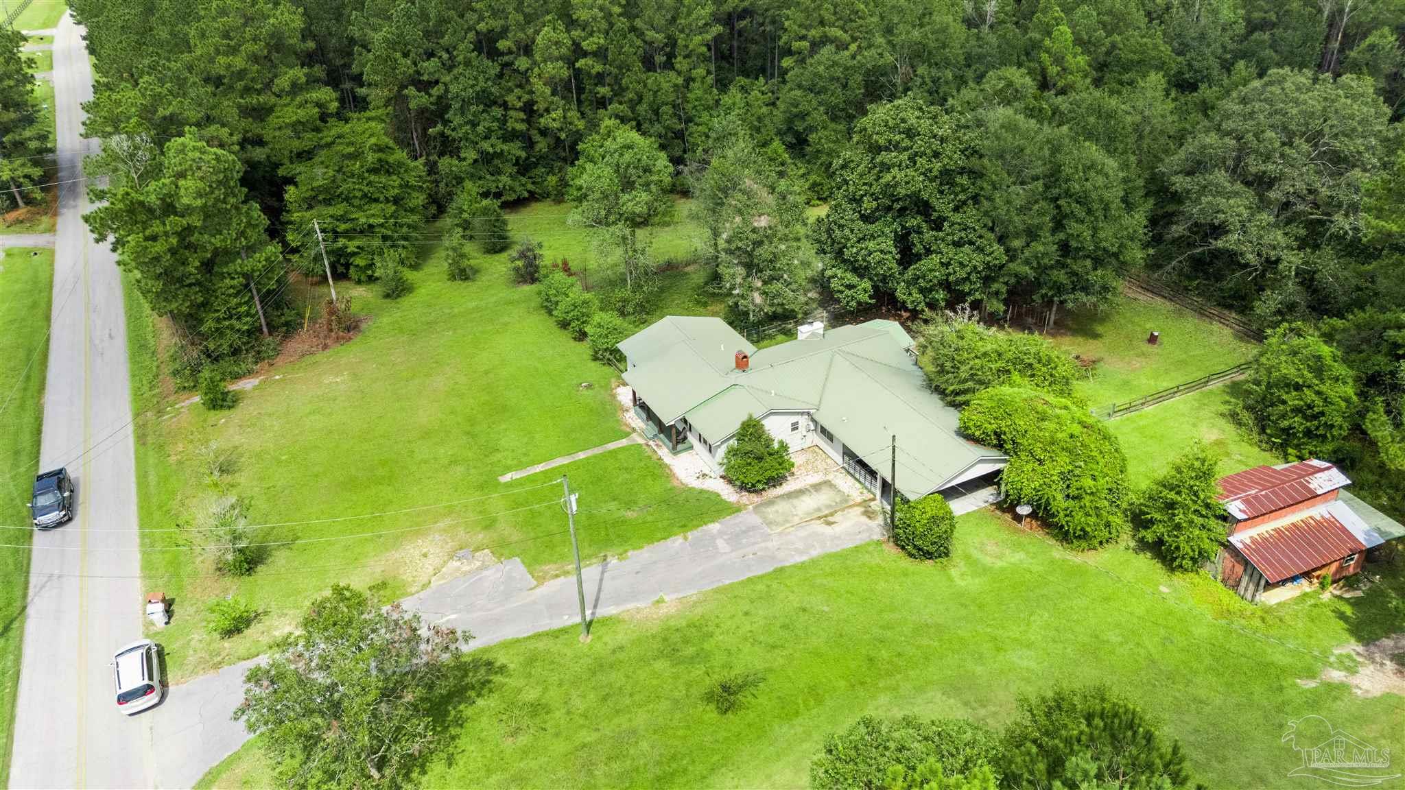 4176 Morristown Road Jay, FL 32565 - Photo 29 of 41 an aerial view of residential house with outdoor space and trees all around