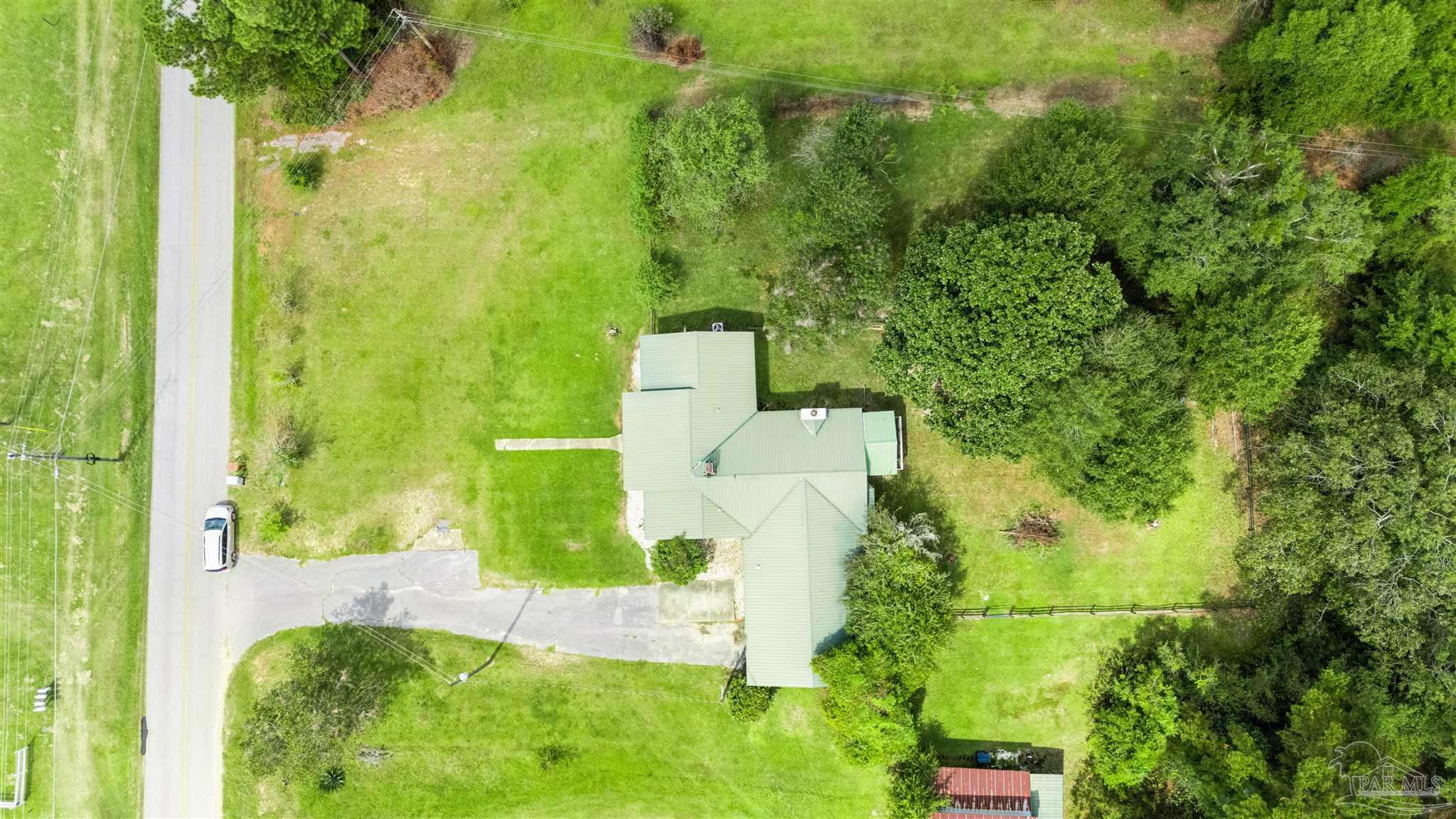 4176 Morristown Road Jay, FL 32565 - Photo 30 of 41 an aerial view of a residential houses with yard