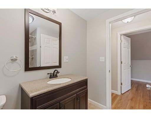 7 Kipling Road Arlington, MA 02476 - Photo 20 of 22 a bathroom with a sink vanity granite and a mirror
