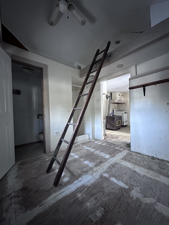 404 Sylvester Road Northampton, MA 01062 - Photo 5 of 5 a view of a hallway with stairs