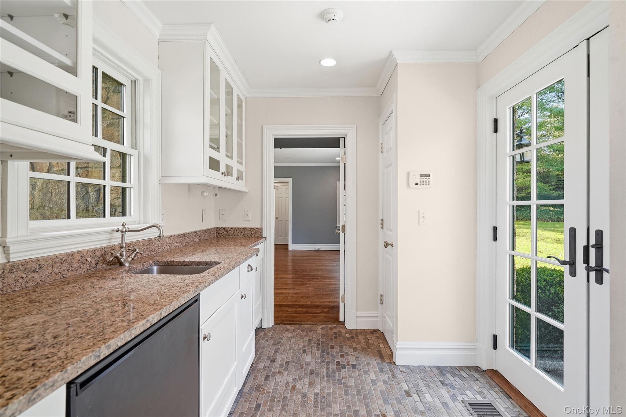 6 Club Road Rye, NY 10580 - Photo 11 of 26 a bathroom with a granite countertop sink and a window
