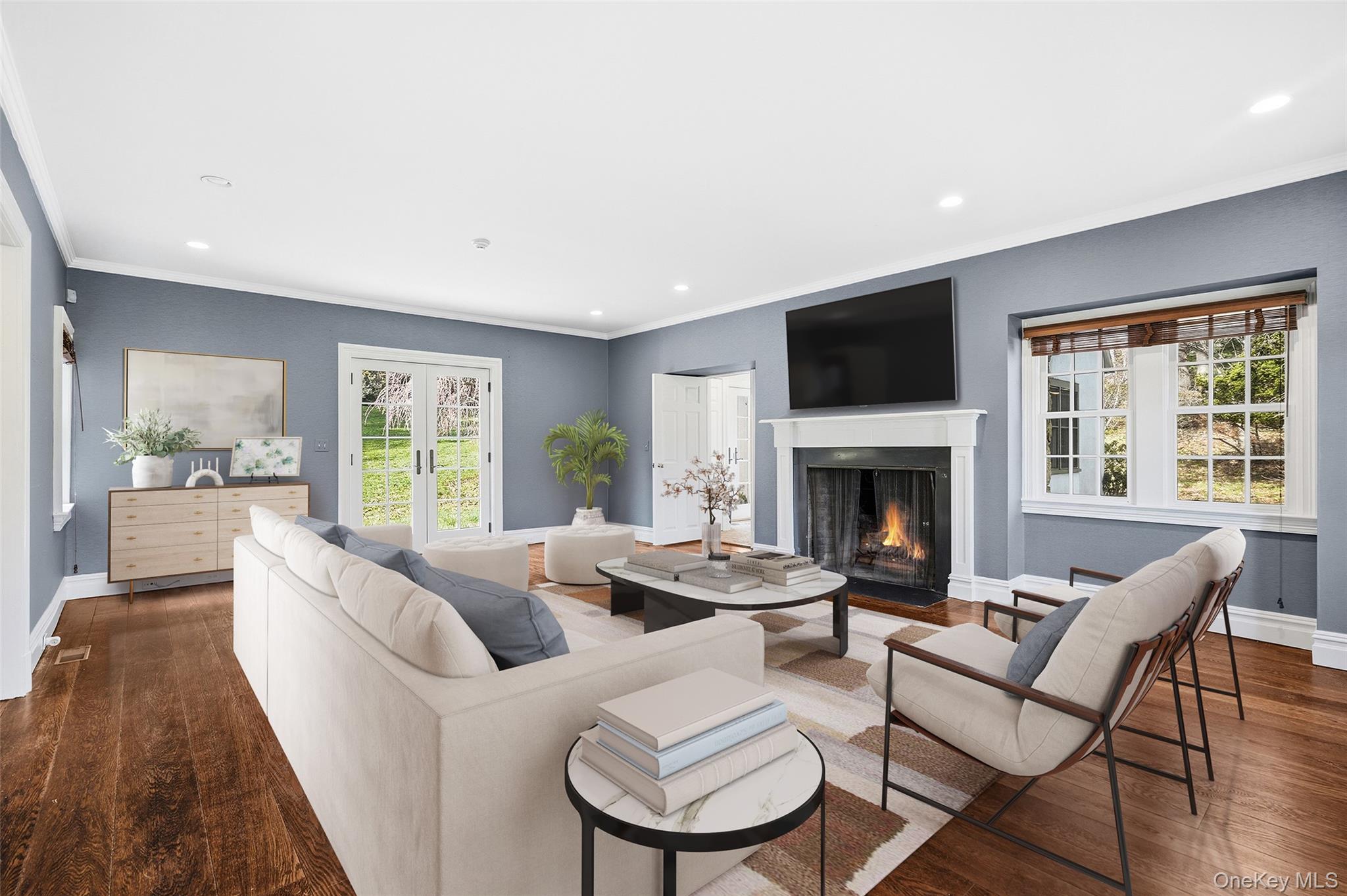 6 Club Road Rye, NY 10580 - Photo 9 of 26 a living room with furniture fireplace and a flat screen tv