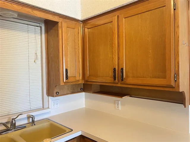 a bathroom with a tub and a sink