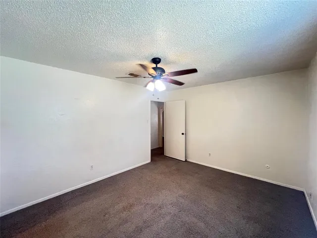 a view of entryway with a fan