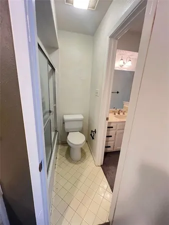 a bathroom with a sink and a toilet