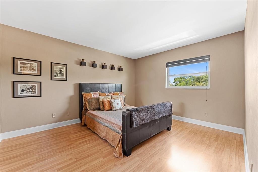 2451 Southwest 82nd Avenue, Unit 310 Davie, FL 33324 - Photo 13 of 21 a living room with furniture and a wooden floor