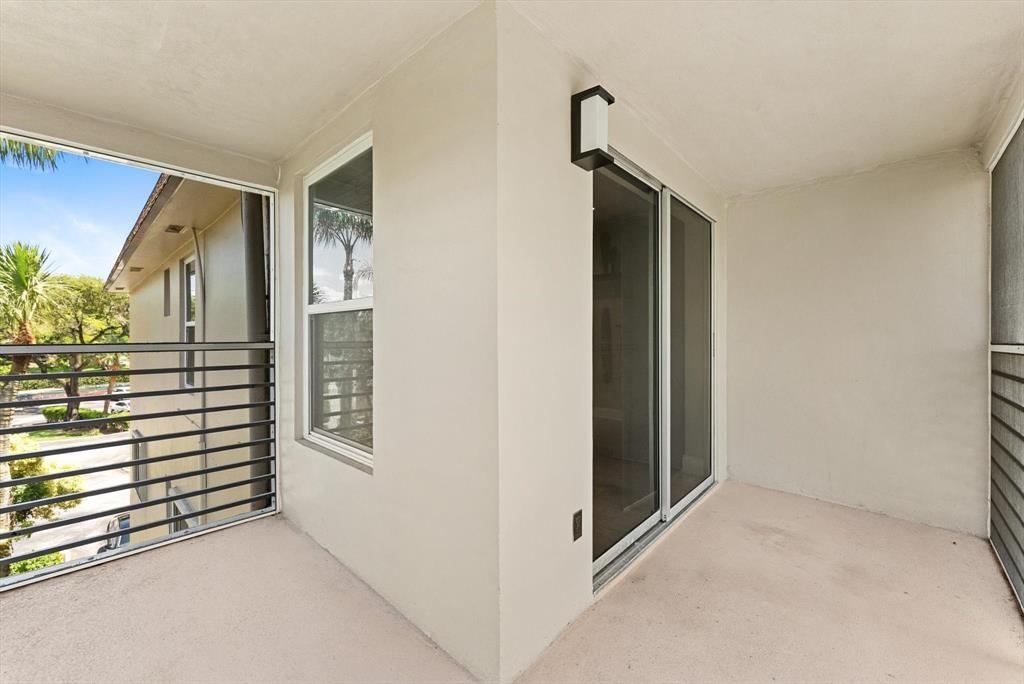 2451 Southwest 82nd Avenue, Unit 310 Davie, FL 33324 - Photo 19 of 21 a view of hallway with stairs