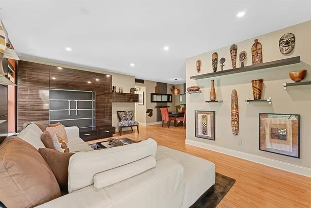 a living room with furniture and a table