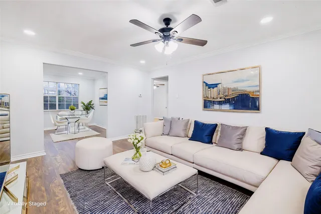 a living room with furniture and a rug