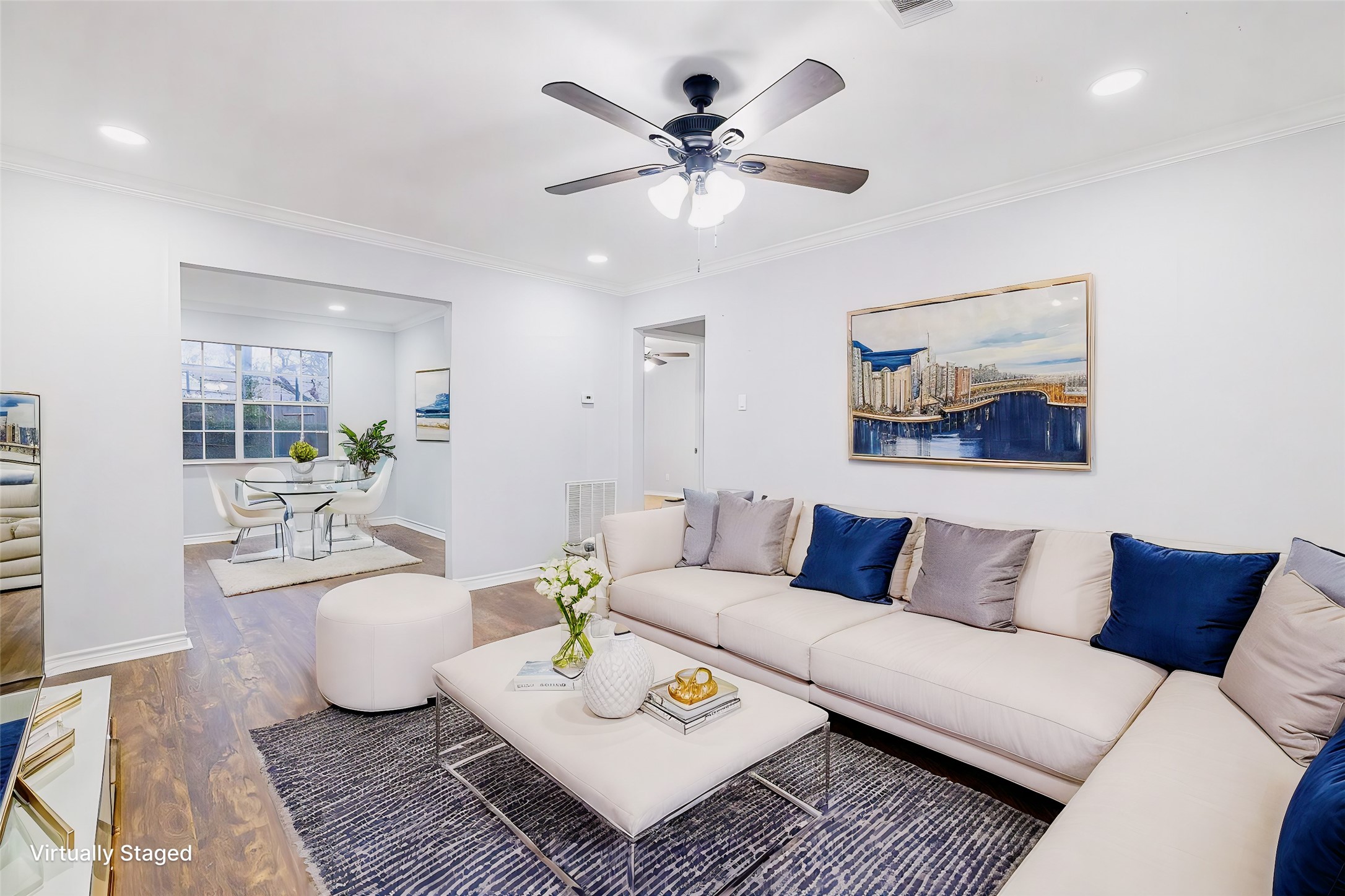 a living room with furniture and a rug