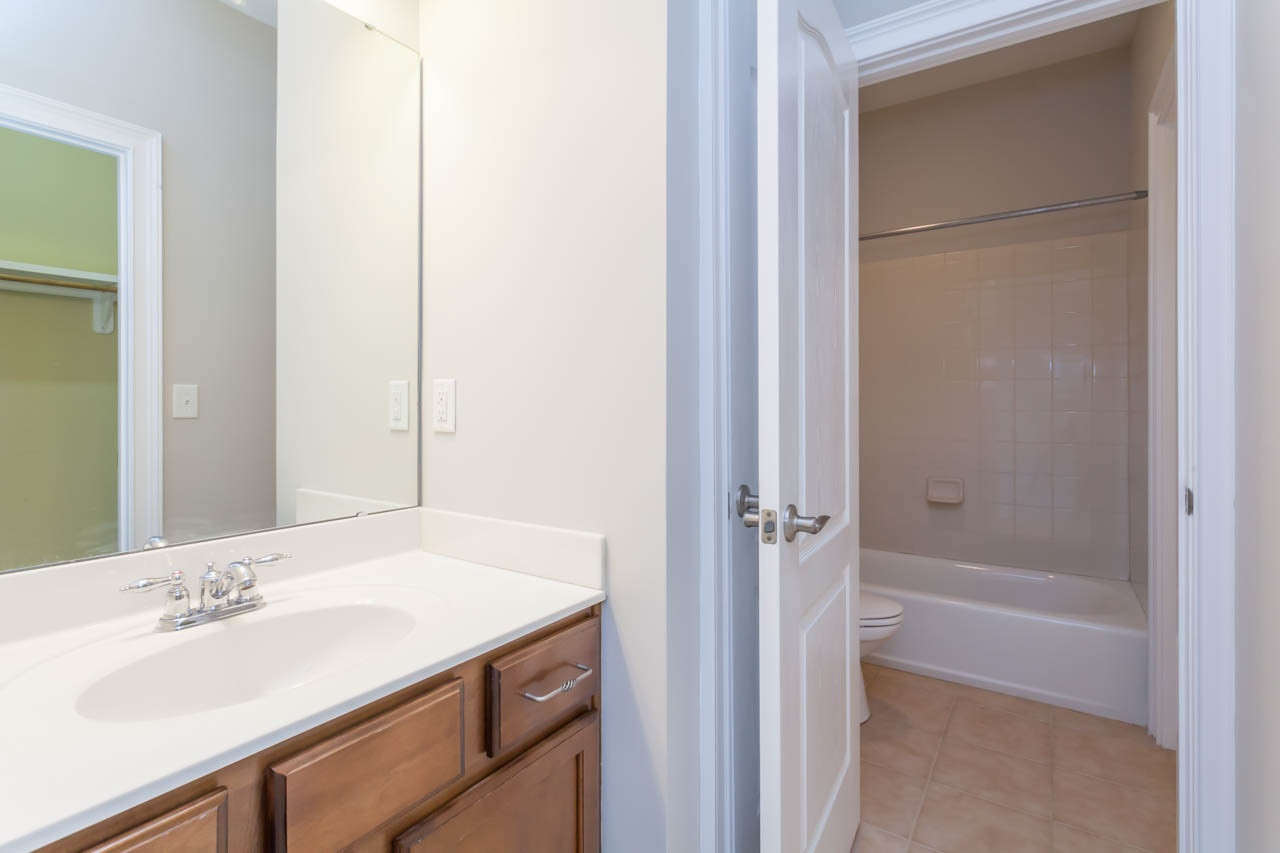 8915 Scotch Castle Drive Raleigh, NC 27612 - Photo 20 of 25 This versatile "Jack and Jill" bathroom provides a room for the tub/shower combination and 2 separate vanity areas. Wonderful Bathroom on 2nd Floor!