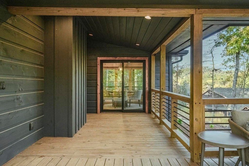 61 River Retreat Road Blue Ridge, GA 30513 - Photo 77 of 82 a view of a porch with wooden floor and outdoor space