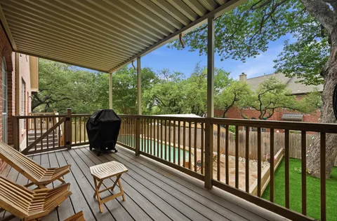 a view of a chairs on the roof deck