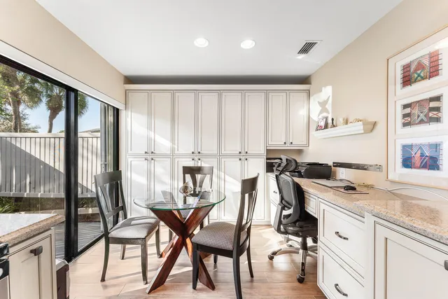 a kitchen with a stove a sink and a refrigerator