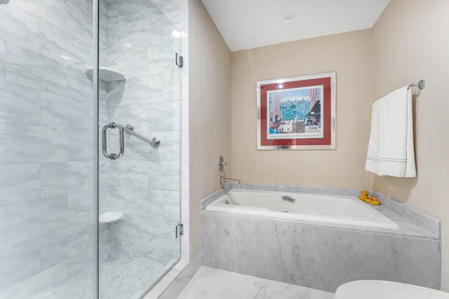 a view of a chair and table in backyard