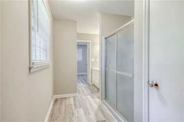 a bathroom with a sink a toilet a mirror and vanity
