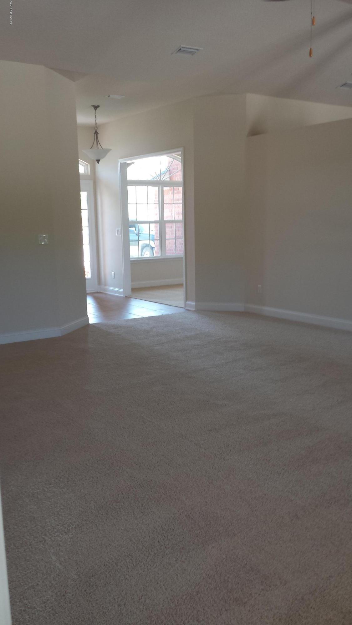 2996 Longleaf Ranch Circle Middleburg, FL 32068 - Photo 5 of 8 2169 family room
